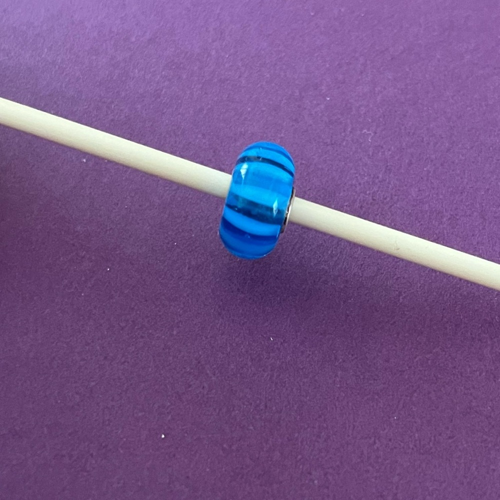 Trollbeads Retired turquoise stripe bead. TGLBE-10052.